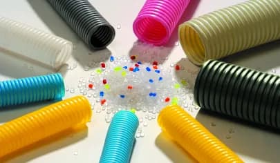 Corrugated pipes with polymer granules